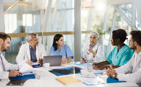 Meeting of doctors in a healthcare cooperative